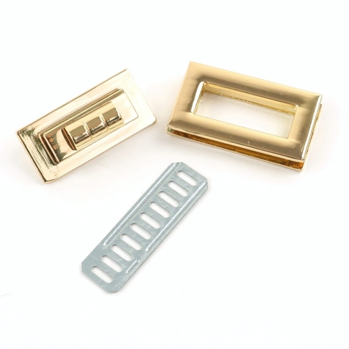 Zapięcie obrotowe 40x20mm do torebki kolor złoty